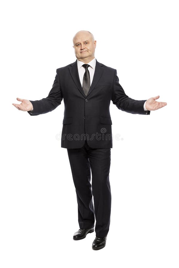 Smiling bald middle-aged man in a suit, full-length, isolated on white background. stock image Smiling bald middle-aged man in a suit, full-length, isolated on white background. stock image