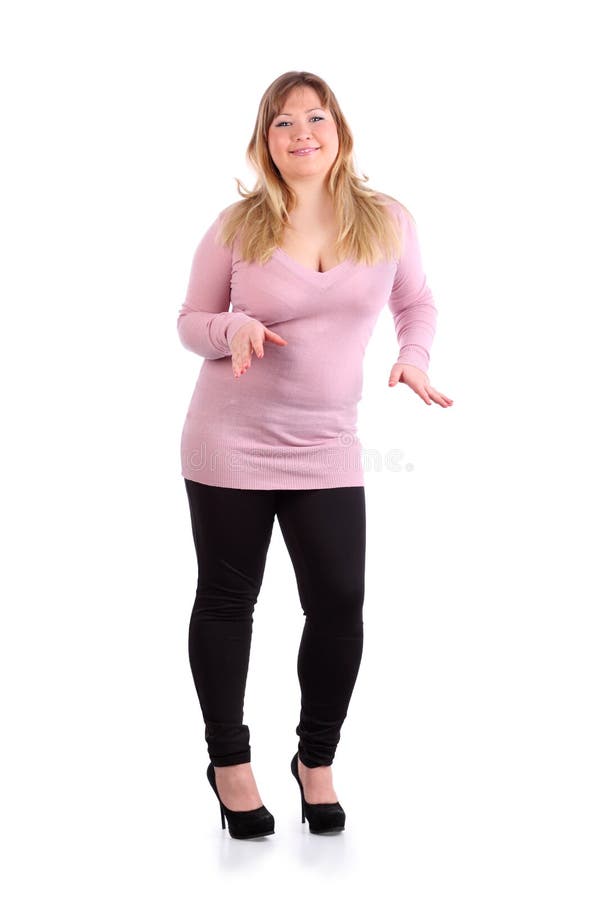 Smiling beautiful woman dances isolated stock photography