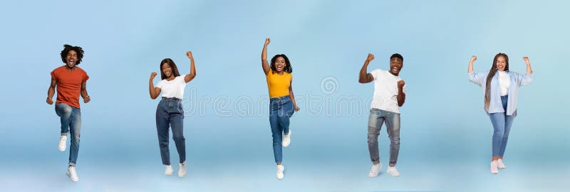 Smiling black young people jumping, making success sign, celebrating victory, enjoy spare time royalty free stock photos