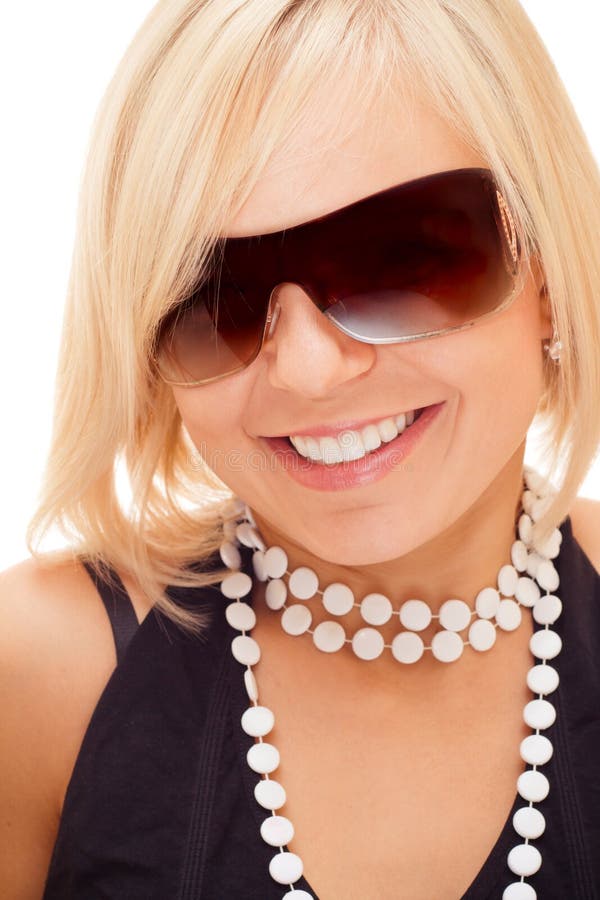 Smiling blond girl in sun glasses