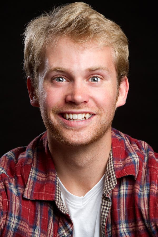 Happy cheerful young man smiling. Happy cheerful young man smiling