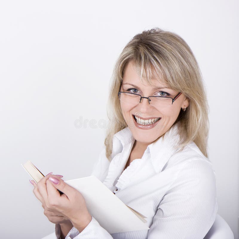 The smiling blonde with the book