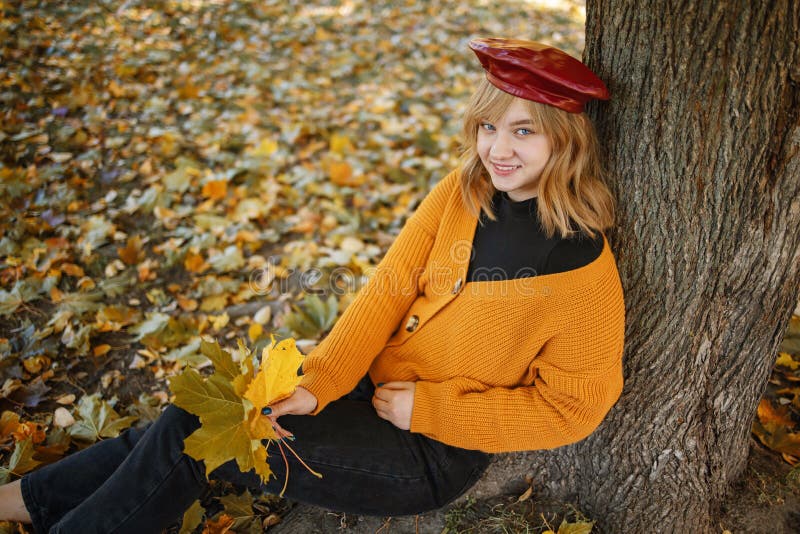 In Nature's Garb golden-haired UK legal age teenager posing