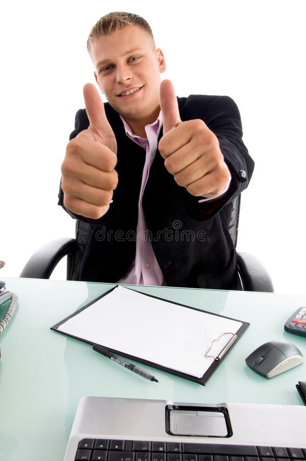 Smiling boss showing thumbs up with both hands