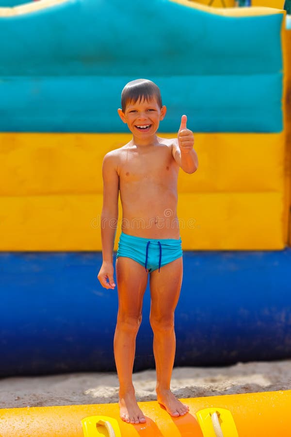 Swimming trunks boy hi-res stock photography and images - Alamy