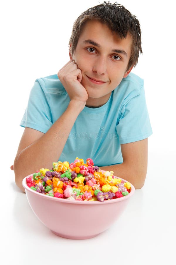 Smiling boy with bowl of popcorn