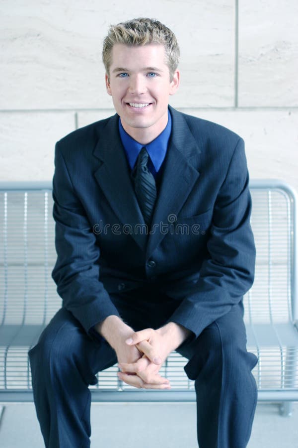 Smiling Business Man with Folded Hands