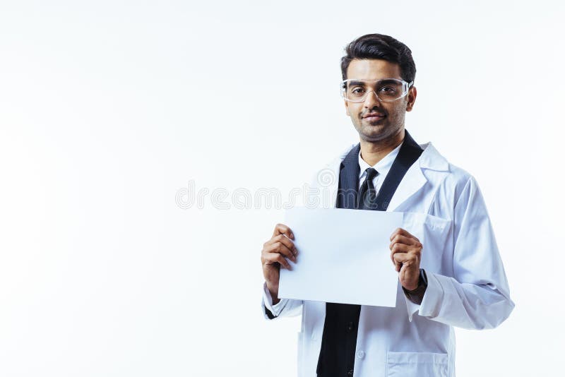 Smiling business man looking at camera wearing protective glasses stock photos Smiling business man looking at camera wearing protective glasses stock photos