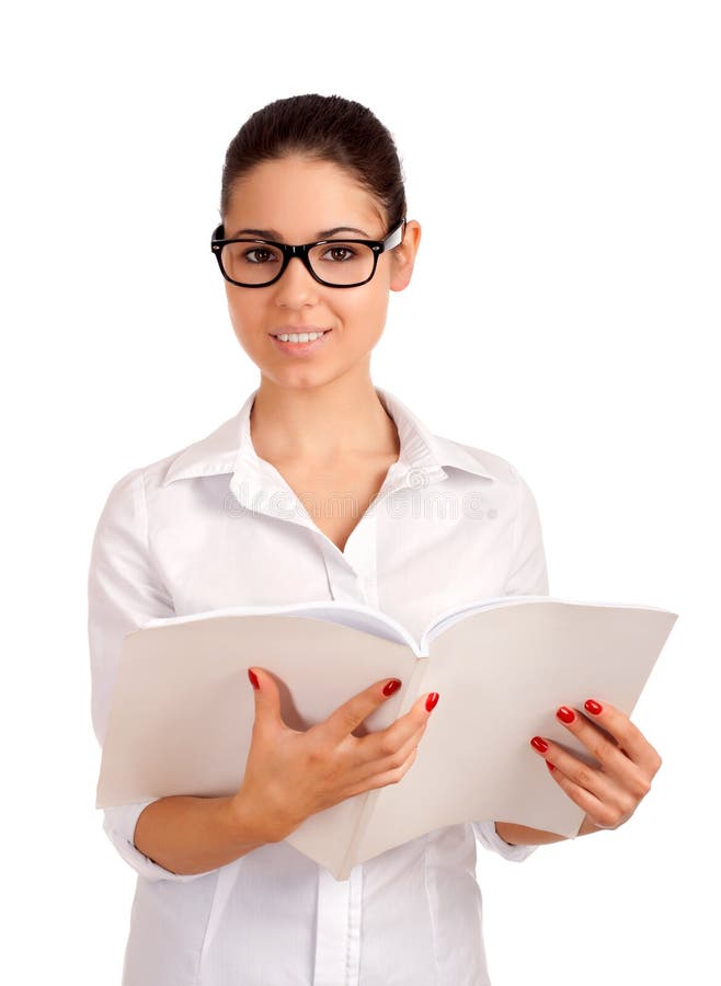 Smiling business woman holding magazine