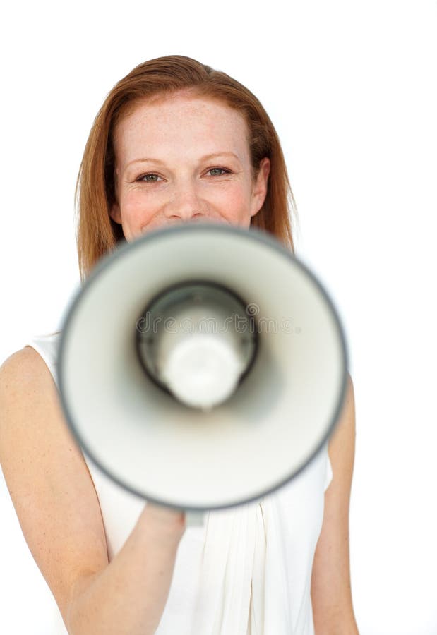 Smiling businesswoman using a megaphone isolated on a white background