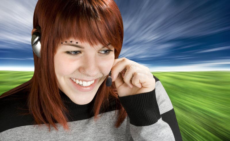 Smiling call center redhead