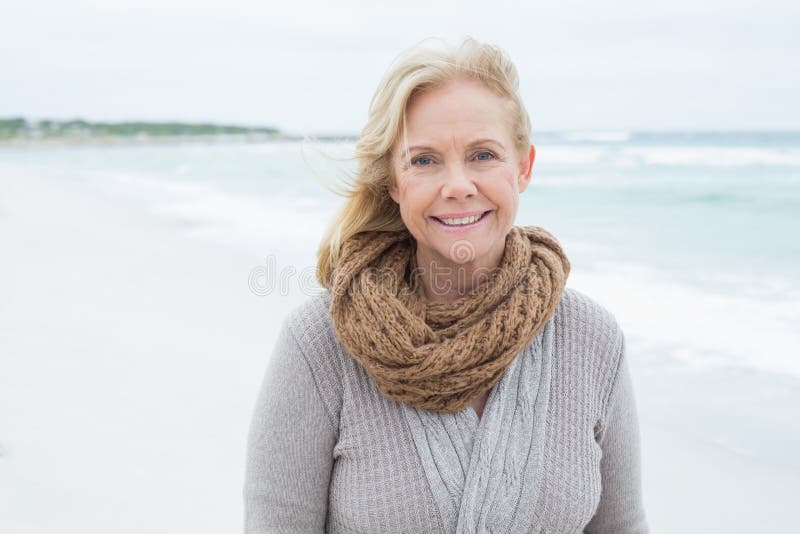 Smiling Casual Senior Woman Relaxing at Beach Stock Image - Image of ...