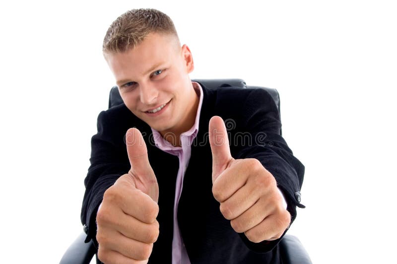 Smiling ceo showing thumbs up with both hands