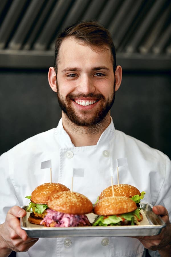 Chef with Burgers in Restaurant Kitchen Stock Photo Image of tasty