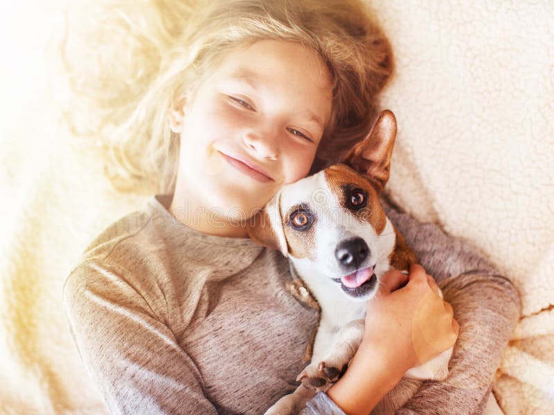 Smiling child with dog royalty free stock photography Smiling child with dog royalty free stock photography