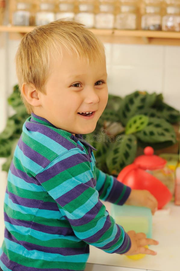 Smiling child in kitchen