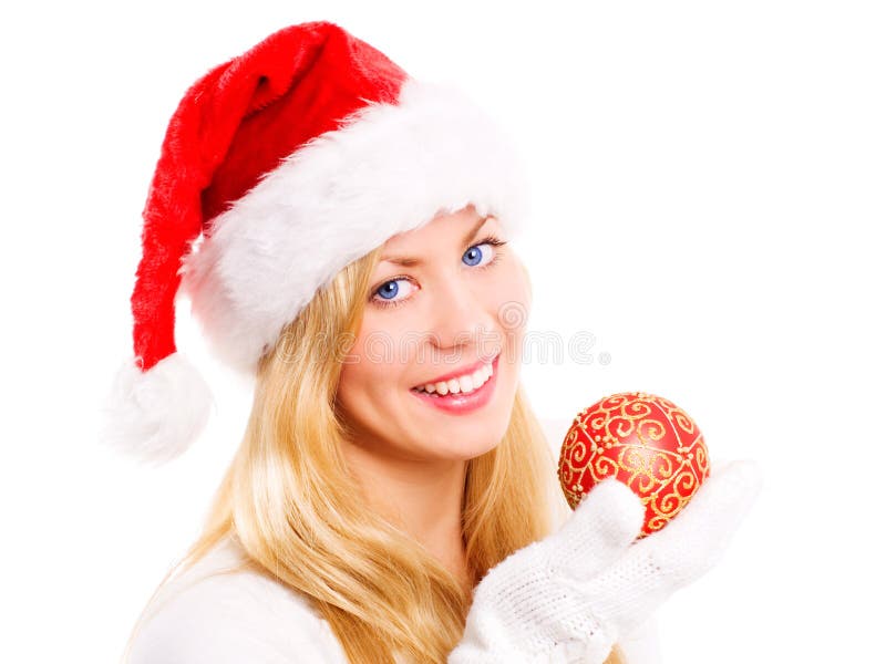 Smiling christmas woman holding glass ball