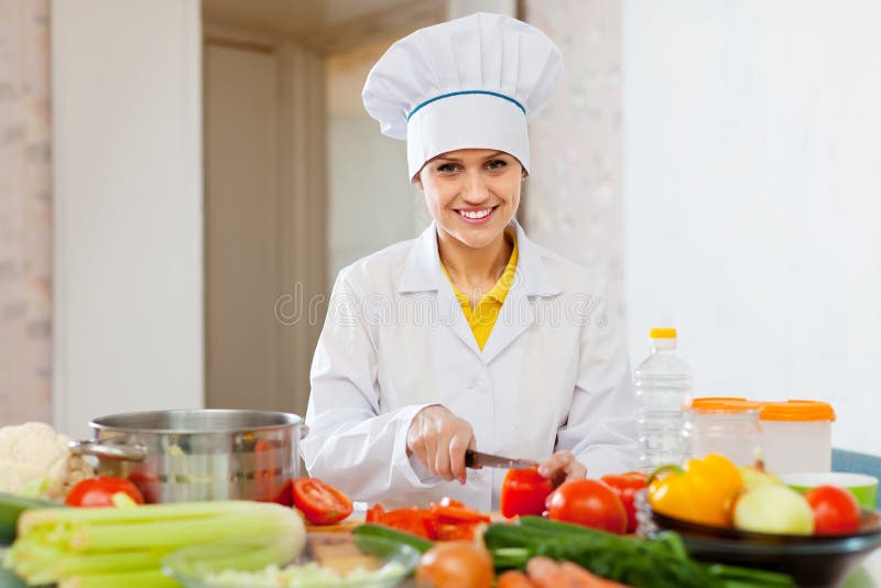 Smiling Cook Works with Tomato and Other Vegetables Stock Image Image