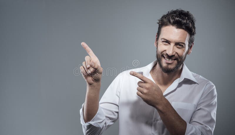 Smiling Cool Man Pointing Up Stock Photo Image Of Cool Determination