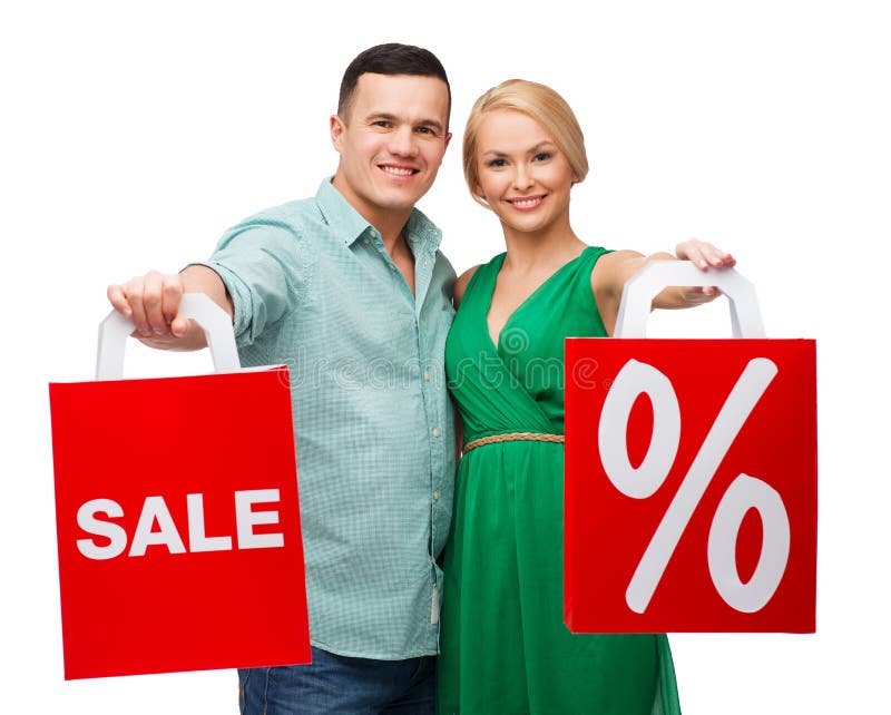 Smiling couple with shopping bags