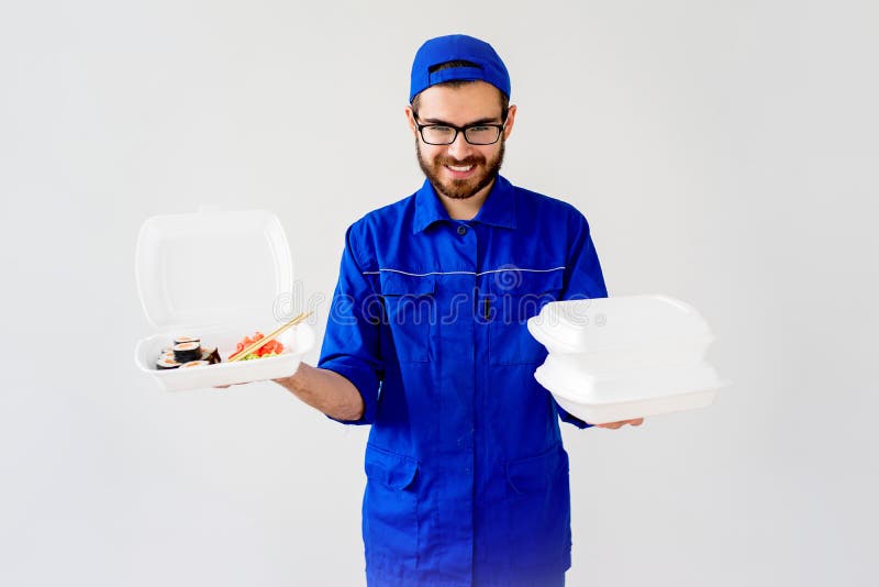 Smiling delivery guy royalty free stock image