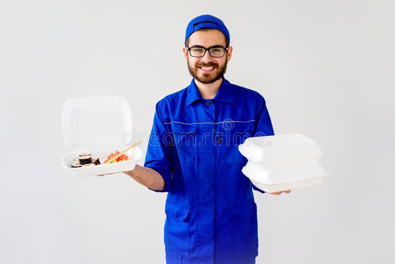 Smiling delivery guy royalty free stock photography