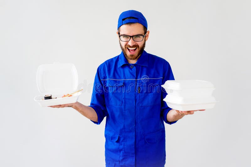 Smiling delivery guy stock photo