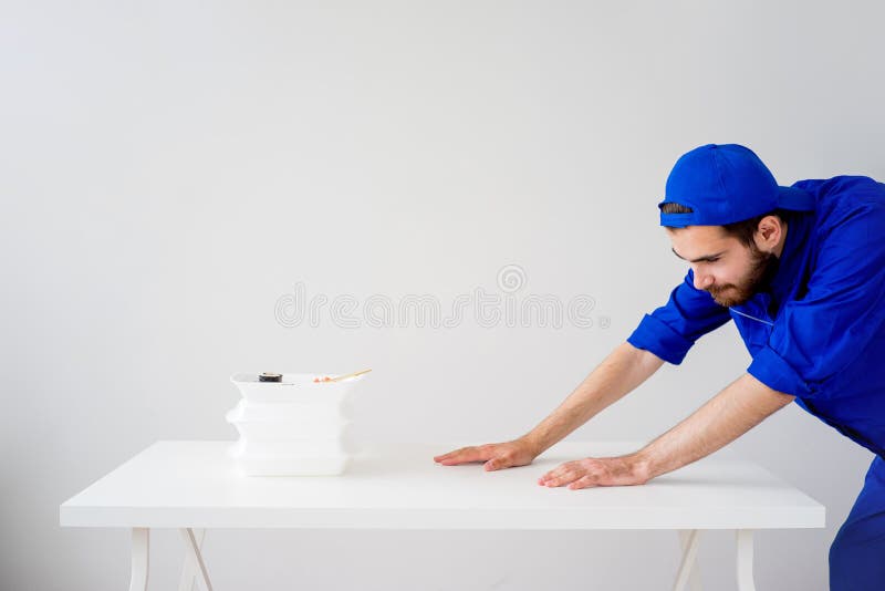 Smiling delivery guy royalty free stock image