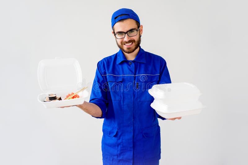 Smiling delivery guy stock images