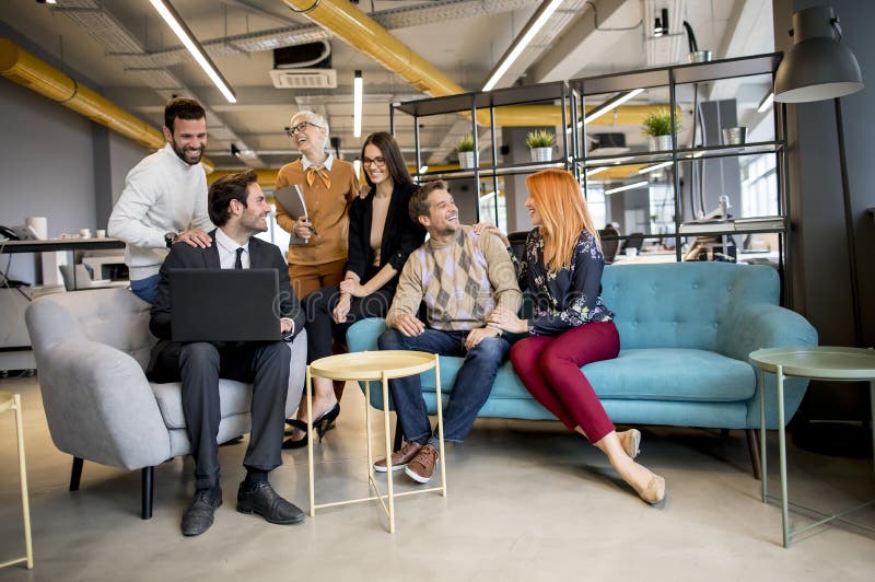 Smiling Diverse Businesspeople Talking in an Office Stock Photo - Image ...