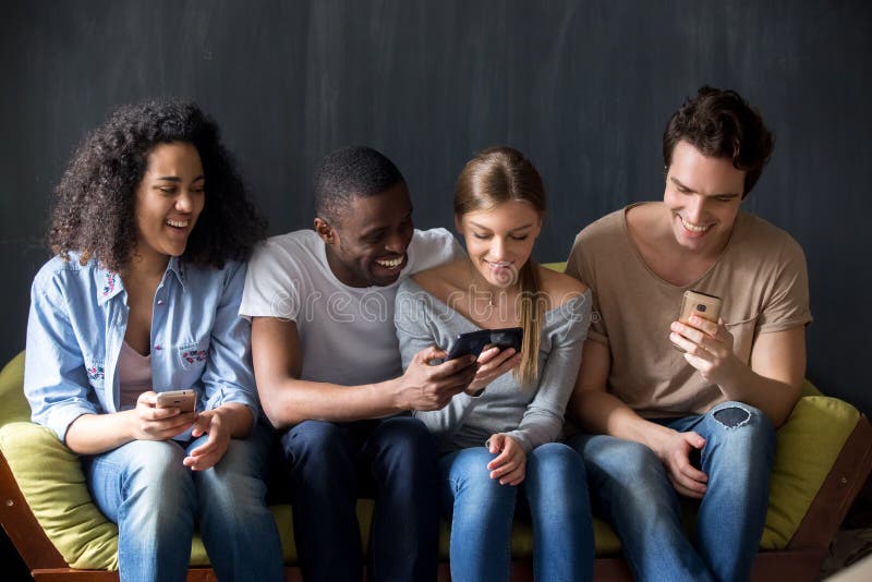 Smiling Diverse Friends Discussing New Apps for Mobile Phone. Stock Photo - Image of laughter, group: 154154358 Smiling Diverse Friends Discussing New Apps for Mobile Phone. Stock Photo - Image of laughter, group: 154154358