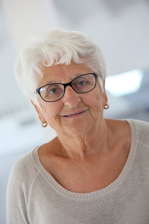 Smiling Elderly Woman with Eyeglasses Stock Image Image of
