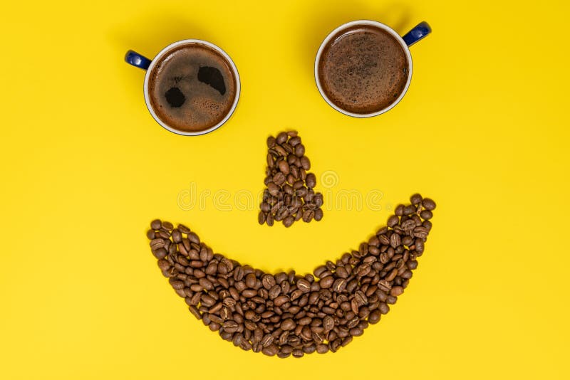 A Smiling Emoticon, Lips Made of Coffee Beans, and Eyes Made of Coffee