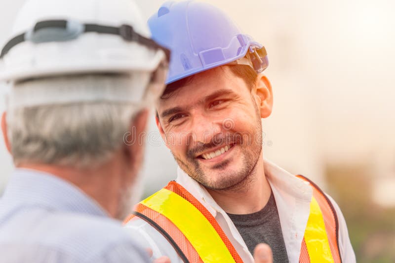 Smiling engineer happy to working together royalty free stock photography Smiling engineer happy to working together royalty free stock photography