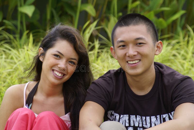 Smiling ethnic couple