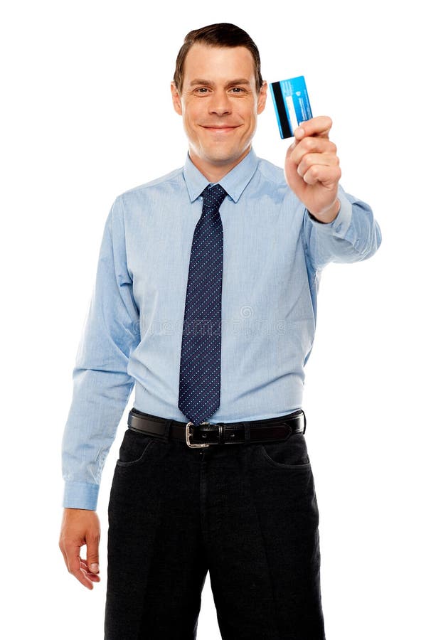 Smiling executive showing credit card royalty free stock image