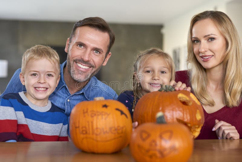 Smiling family in Halloween time royalty free stock photo