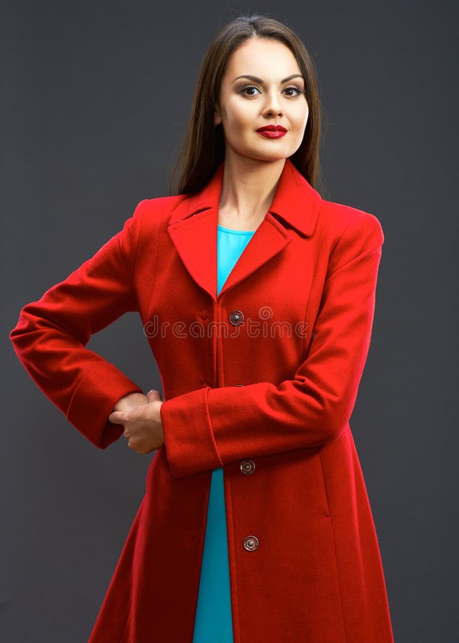 Smiling Fashion Model with Long Hair Red Coat Dressed Standing Stock ...