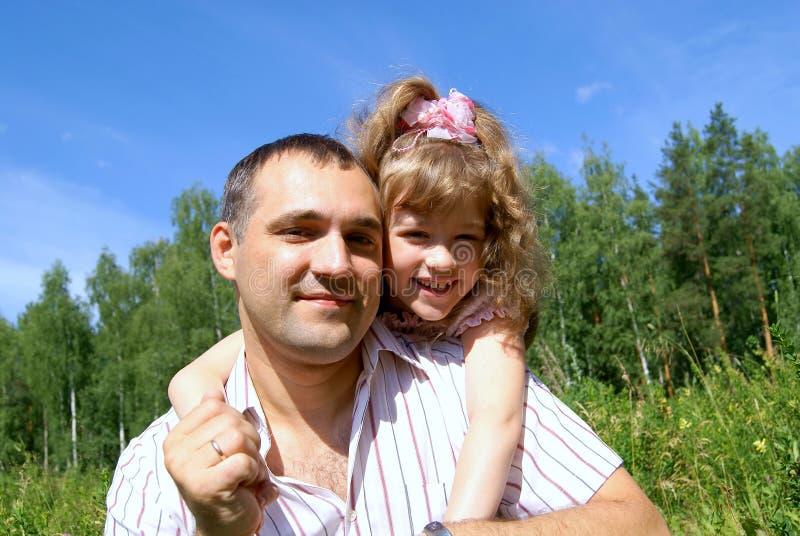 Smiling father and the daughter