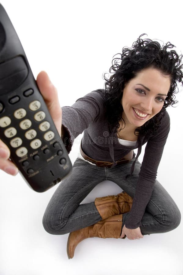 Smiling female showing remote