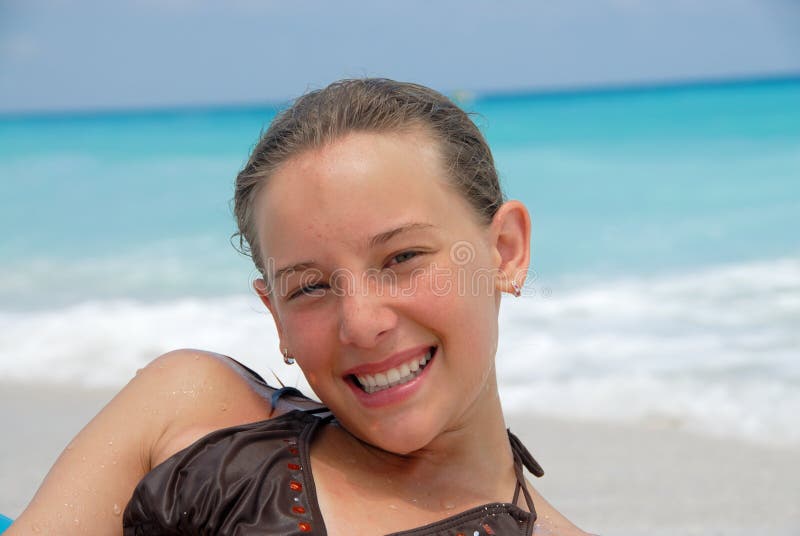 Smiling girl at the beach