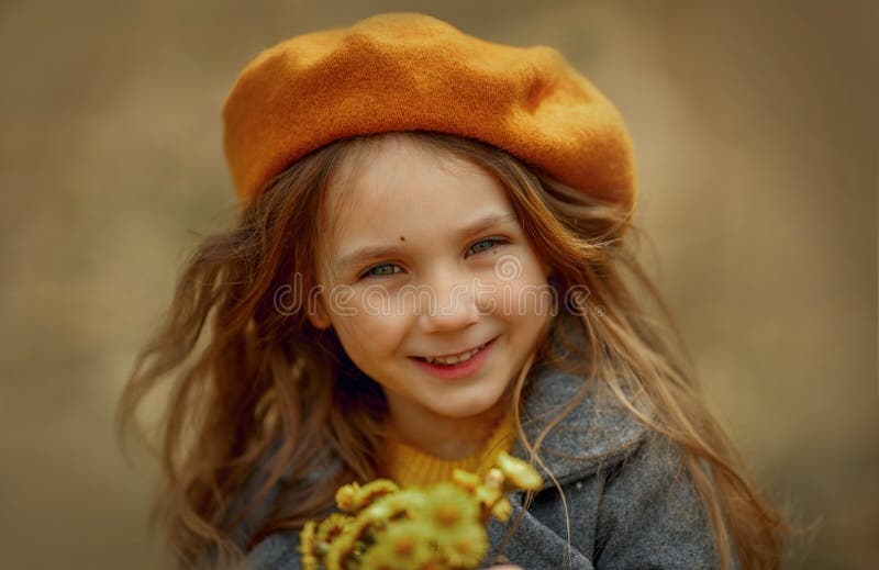 Smiling girl portrait with  flowers