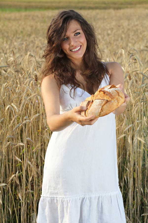 Smiling Girl Offering Bread Stock Photo Image of bread, country 25571862
