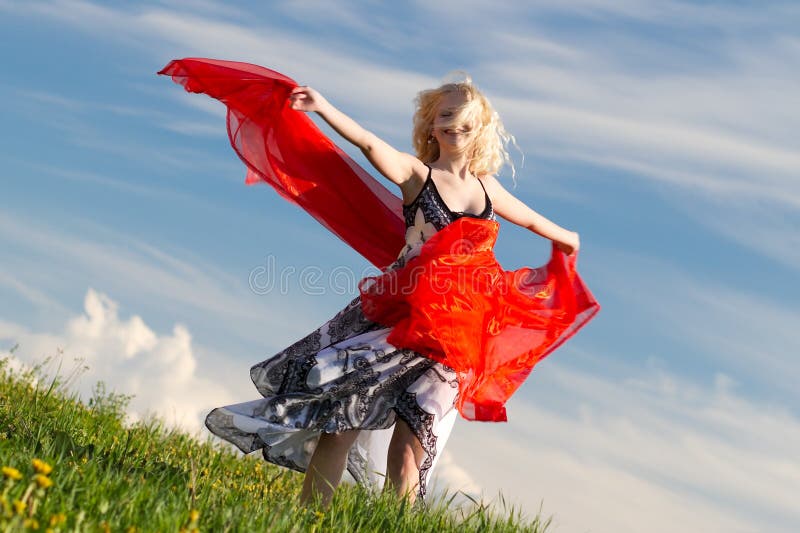 Smiling girl with red scarf