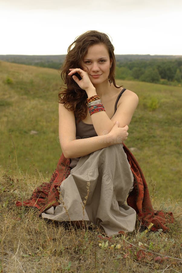 Smiling girl in a red stole