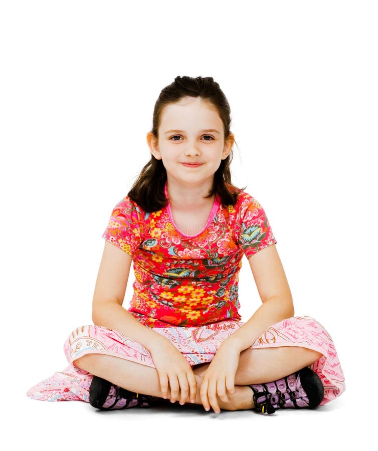 Smiling girl sitting on the floor