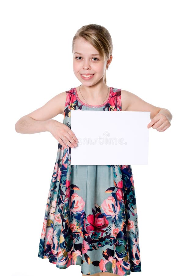 Smiling girl standing with empty blank paper in hands