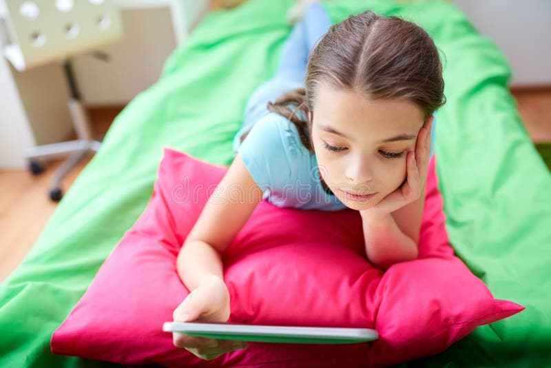 Smiling Girl With Tablet Pc Lying In Bed At Home Stock Image Image Of