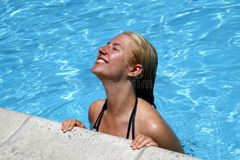 Smiling girl in water