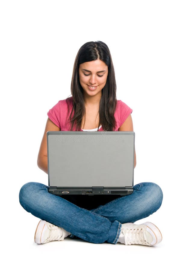 Smiling girl working on laptop royalty free stock images